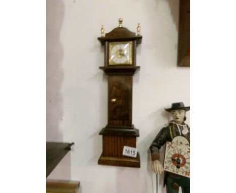 A miniature Grandfather clock