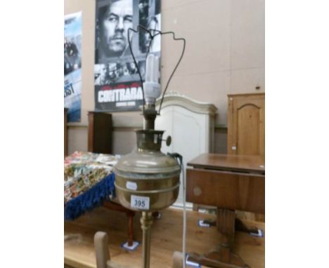 A brass standard oil lamp converted to electric