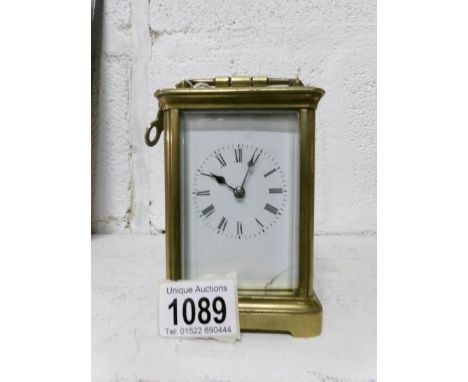 A brass carriage clock