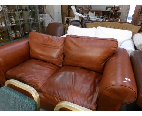 A tan leather sofa