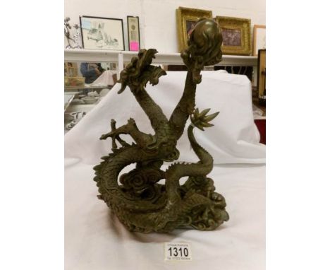 A Chinese bronzed statue of a dragon