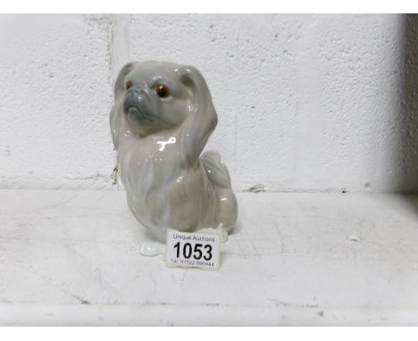 A Lladro Pekinese dog