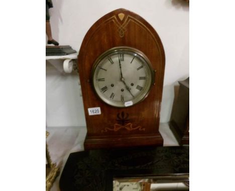 An inlaid Lancet clock with silvered dial and Westminster chime
