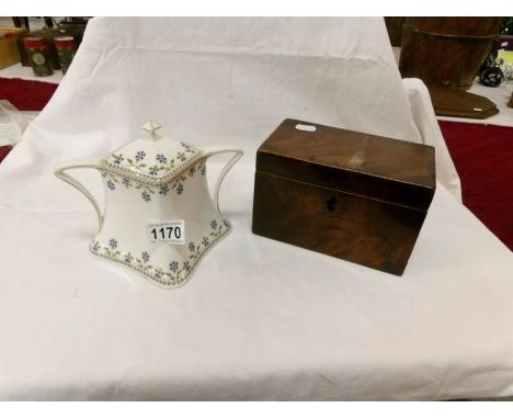 A stylish Art Nouveau Limoges porcelain twin handled sugar box and cover, circa 1905 printed with chanticleer sprigs of organ