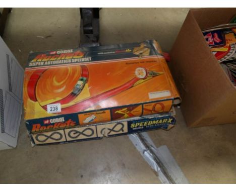 A Marx Speedmarx racing set and a Corgi Rockets speed set