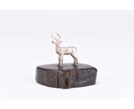 A Patrick Mavros silver model of an impala, presented upon wood base, 4.5cm high