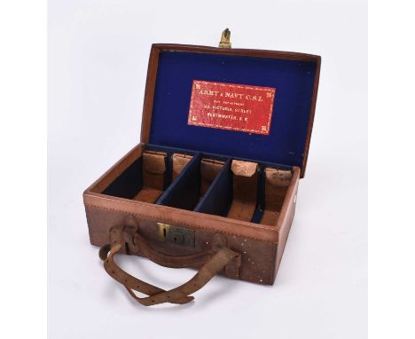 An Army &amp; Navy leather ammunition caseWith Secure Lever brass lock, interior fitted with dividers and leather straps, the