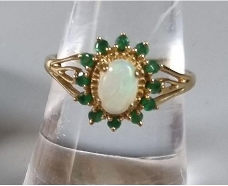 9ct gold opal and green stone ring.  2.2g approx.  Ring size N 1/2.    (B.P. 21% + VAT) 