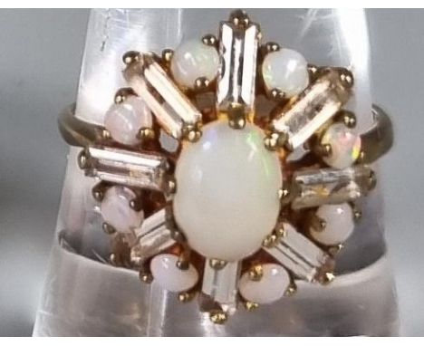 9ct gold opal flower head design ring. 3.6g approx. Ring size P. (B.P. 21% + VAT)