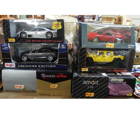 Collection of eight Maisto 1:18 scale model vehicles in original boxes, to include: Mercedes CLK-GTR, Ferrari 348 etc.  (8)  