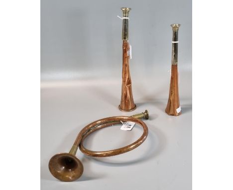 Two copper and silver plate hunting horns, one marked Swain &amp; Adeney, Piccadilly, London together with small French style