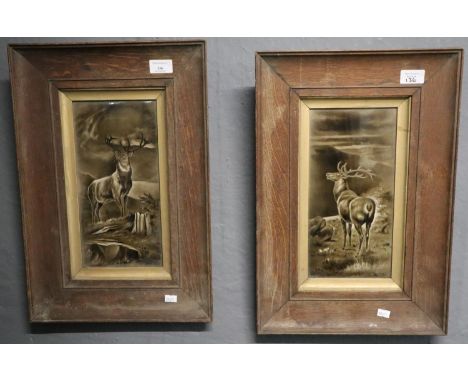 Pair of 19th century rectangular ceramic tiles depicting stags in landscapes. 30x15cm approx. Oak frames with gilt slips. (2)