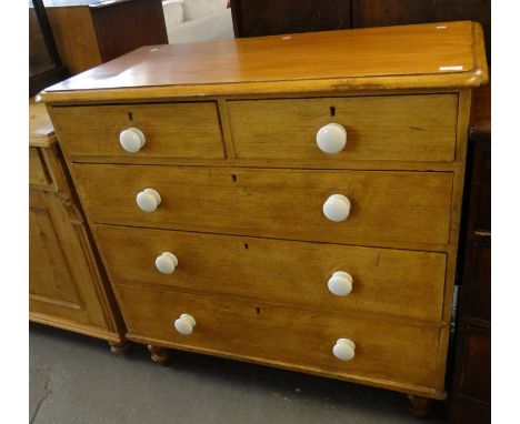Victorian pine straight front chest of two short and three long drawers with white ceramic knob handles on baluster turned le