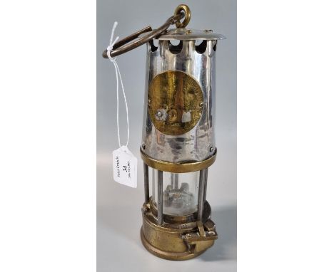 The Protector Lamp &amp; Lighting Co Ltd type GR6 brass and aluminium Miners safety lamp, appearing cleaned but in used condi