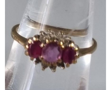 9ct gold ruby and diamond dress ring. 1.9g approx.  Ring size K.     (B.P. 21% + VAT) 