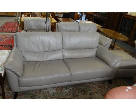 Good quality modern leather four piece suite comprising large sofa, smaller two seater sofa, electric armchair and footstool.