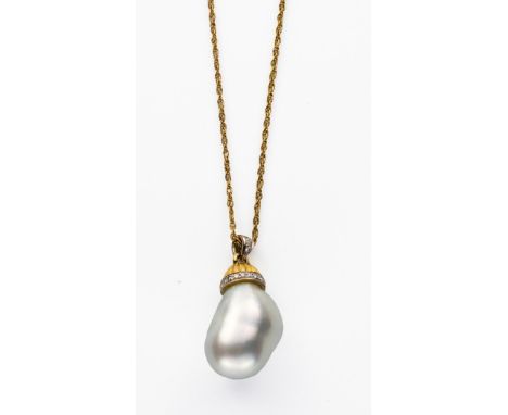 Centred with a baroque pearl, the reeded cap and the bale embellished with round brilliant-cut diamonds weighing approximatel