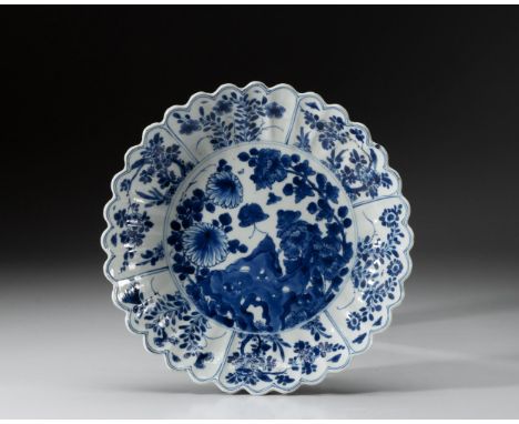 The scalloped chrysanthemum-shaped dish painted to the centre with two drooping chrysanthemums and a tree peony issuing from 