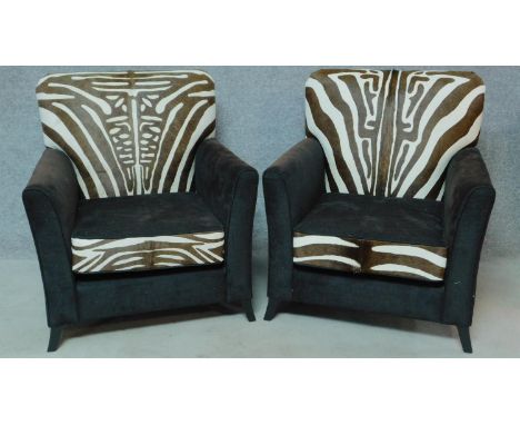 A pair of contemporary pony skin zebra print and black fabric armchairs, by Ninas House. H.92cm 