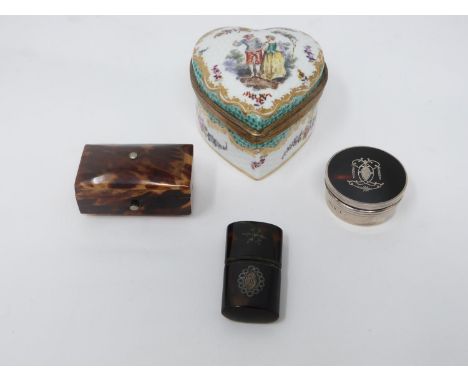 A collection of four trinket boxes. One sterling silver with tortoise shell top. One hand painted heart shaped porcelain box 