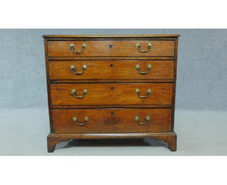 A Georgian mahogany chest of four drawers long drawers on bracket feet. H.76 W.85 D.45cm 