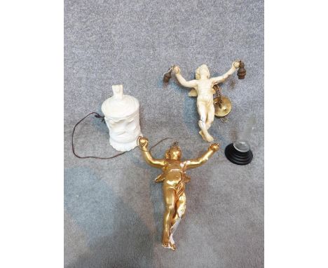 A collection of items, including two plaster cherub light fittings, one gilded, a carved alabaster lamp on shell form feet, l