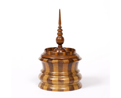 A 19TH CENTURY DUTCH TOBACCO BOX AND COVER with banded alternate light and dark wood turned body, loose inner lid and tall tu