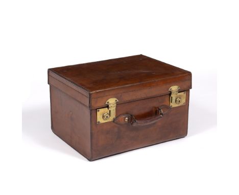 AN EARLY 20TH CENTURY LEATHER SQUARE HAT BOX OR CASE, the lid with embossed initials B. P., stamped Army &amp; Navy with bras