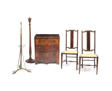 A REPRODUCTION WALNUT AND CROSSBANDED SERPENTINE FRONTED SMALL CHEST of three drawers on bracket feet, 62cm wide, a pair of E