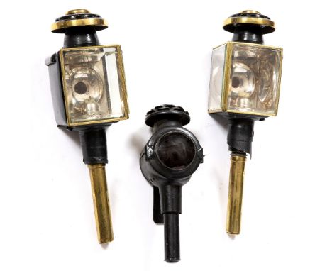 A PAIR OF&nbsp;VICTORIAN BRASS AND BLACK LACQUER CARRIAGE LAMPS 43cm long, and another lamp (3)