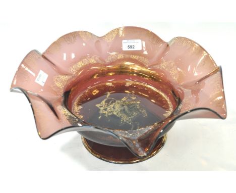 A large amethyst glass bowl