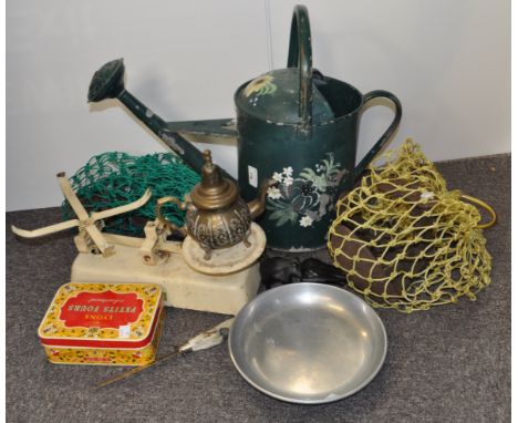 A pair of scales and weights with other items