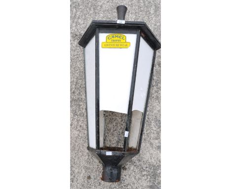 A cast iron lamp post shade.