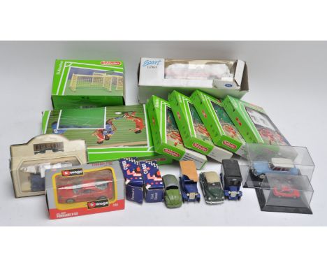 A group of model cars and other items