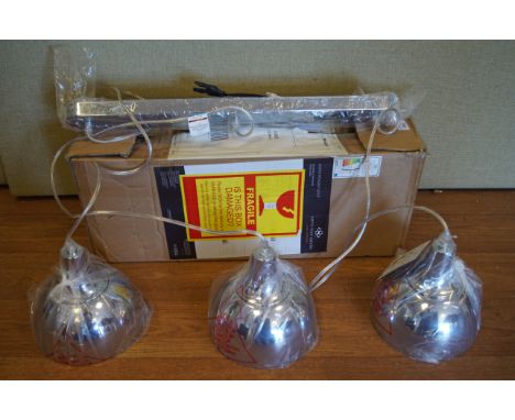 A kitchen island pendant light