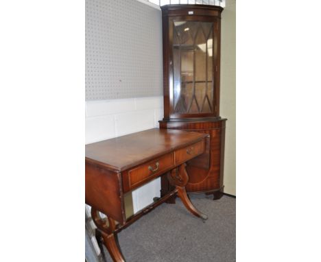 A sofa table and a corner cabinet