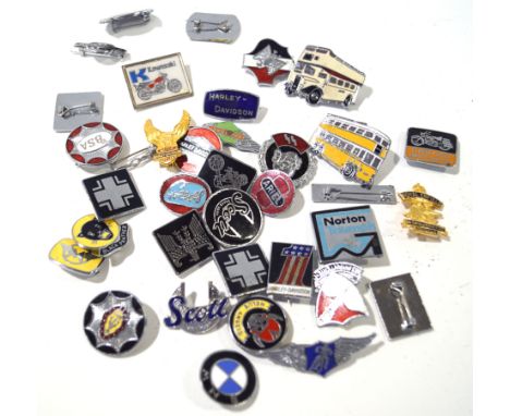 A collection of enamel badges