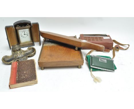A pill roller, carriage clock and other items