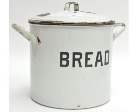 An enamel bread bin and a cistern