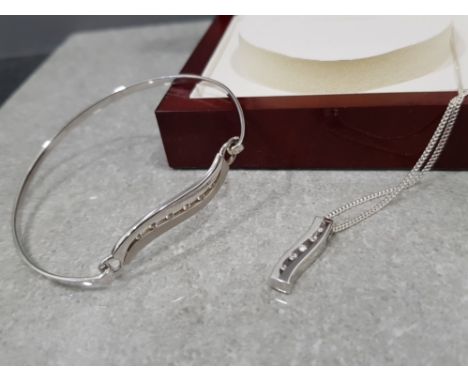 Boxed set of sterling silver &amp; CZ bangle, pendant and chain, 11g gross