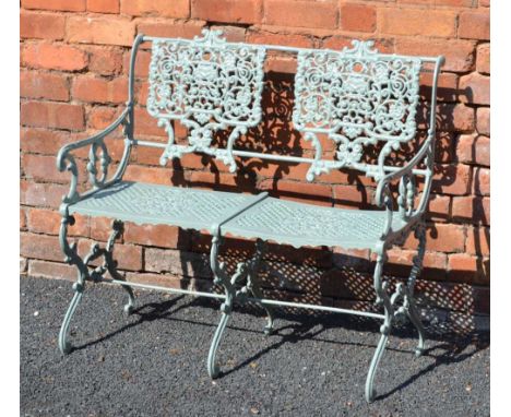 A 20TH CENTURY POSSIBLY FRENCH PAINTED METAL GARDEN TWO-SEATER BENCH, with scrolling foliate back and lattice work seat, curr