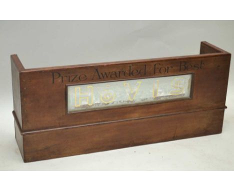 A FIRST QUARTER 20TH CENTURY WOODEN FRAMED HOVIS BRANDED DISPLAY STAND, 27cm x 67cm 