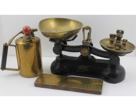 A SET OF BOOTS BRANDED KITCHEN SCALES, with brass pans and six weights, a brass CRIBBAGE BOARD, engraved "A H" and a brass GA