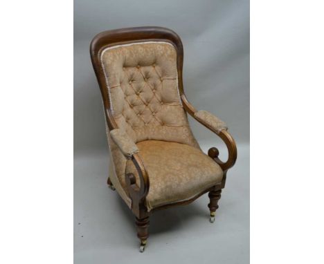 A 19TH CENTURY MAHOGANY FRAMED GENTLEMAN'S ARMCHAIR, with scrolling arms, having neutral velour effect upholstered, button ba