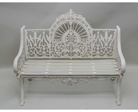 A 20TH CENTURY CAST IRON GARDEN BENCH fashioned in the Coalbrookdale style, finished in white, 94cm high x 120cm wide 