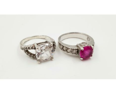 Two Silver Rings: A Pink Tourmaline - Size Q and a Moissanite Ring - Size Q. 