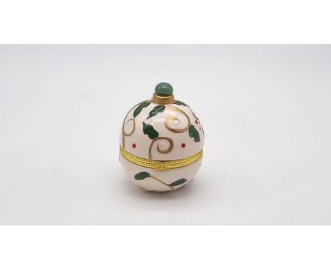 Christmas themed ceramic box in the style of a Faberge Egg. Jade accent top with gold metal clasp. No markings. 7cm in height