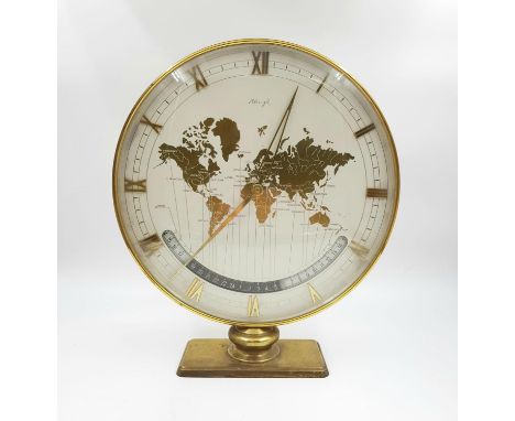 A Beautiful Vintage 1962 Kienzle Brass World Time Desk Table Clock. Mechanical Wind (hand-wind) movement. World map with worl