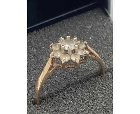 9 carat GOLD CLUSTER RING Having pale aqua stones set to top.1.3 grams. Size L 1/2. 