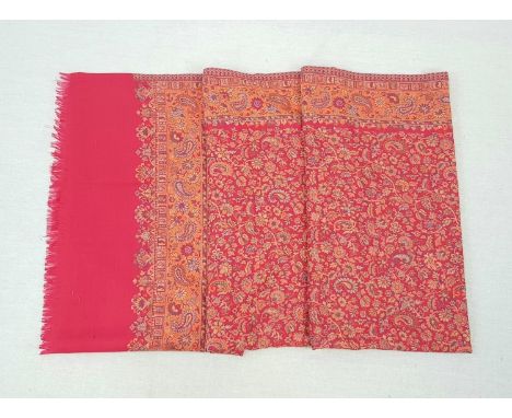 A very large red paisley wool scarf/shawl. 220cm x 110cm. Good condition. 